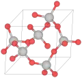 Estructura cristalina del α-cuarzo (las bolas rojas son de oxígeno y las grises de silicio)