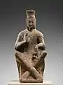 Bodhisattva con los tobillos cruzados.