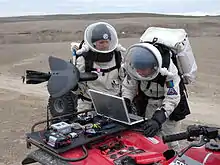 Crew members Kristine Ferrone and Joseph Palaia operate the Maveric Unmanned Aerial Vehicle (UAV) on July 24, 2009.