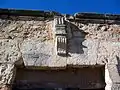 Detalle del frontispicio de la iglesia de San Miguel en Moya (Cuenca), con detalle de la fecha de fábrica: 1661.