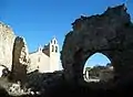 Vista de la iglesia de Santa María en Moya (Cuenca), desde el solar de la iglesia de la Trinidad, antes de su restauración.