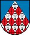 Cortinado Losanjado de gules y plata hecho de arniño, y campo de azur