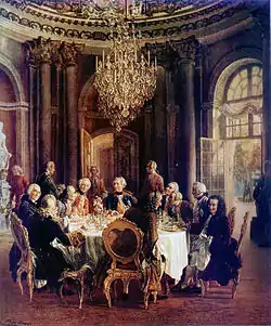 Federico de Prusia comiendo con Voltaire y otros filósofos, por Adolph von Menzel, 1850.