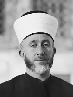 Amin al Husayni, líder político y religioso musulmán en el Mandato Británico de Palestina y principal aliado islámico del Tercer Reich, de los creadores de la Legión Árabe Libre.