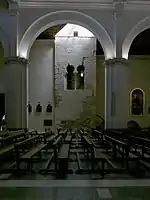 Restos del primitivo alminar reutilizado como campanario de la iglesia de Santiago, Córdoba