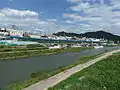 Along Jeonju River and across from Nambu Market.