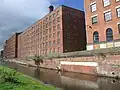 El canal de Rochdale en Ancoats y el molino Murrays