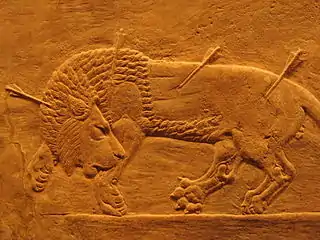 El león herido (de la cacería de Asurbanipal)