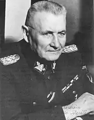 Nació en el Imperio Ruso (Letonia) el 21 de julio, 1878 y falleció el 25 de febrero de 1958 en Alemania.  Sirvió militarmente en el imperio ruso, en el movimiento blanco (revolución de 1918), en el ejército Letón y en el Tercer Reich Fue el hombre en alcanzar el máximo rango en la Legión Letona, sosteniendo el rango de SS-Gruppenführer, lideraba la legión junto a diferentes diputados y subordinados.