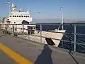 Atraco de un guardacostas de la Prefectura Naval Argentina en el muelle.