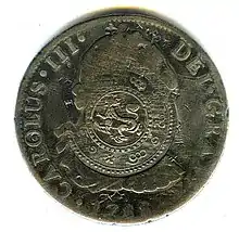 Anverso de moneda de 8 reales (plata) de Carlos III con resello de Birmania.