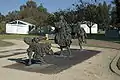 Tres niños jugando a la rayuela (grupo escultórico situado en un  parque de la ciudad de Burswood, un suburbio de Perth, en Australia Occidental, Australia).