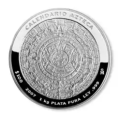 Moneda indicando su peso (1 kg).