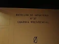 Nombre del batallón seguido por el símbolo dibujado por Francisco José de Caldas antes de ser fusilado.