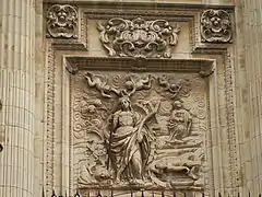 Puerta del clero, relieve de santa Catalina por Lucas González.