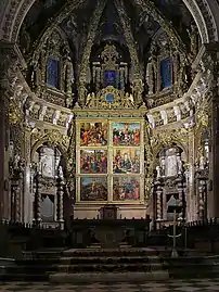 Retablo mayor de la catedral de Valencia, de traza barroca (Juan Bautista Pérez Castiel, 1674-1682) pero cuyas pinturas son renacentistas, muy anteriores (Fernando Yáñez de la Almedina y Fernando de los Llanos, 1506-1510).