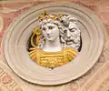 Relieve policromado de Giovanni della Robbia, claustro de Certosa, finales del siglo XV o comienzos del siglo XVI.
