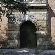 Puerta de la fachada oriental del castillo de Saint-Jory (1545, Nicolas Bachelier).