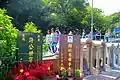 Los participantes en el festival llegan al cementerio Chai Wan Hong Kong, 2015