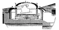 Esquema de una fortificación costera con una torreta giratoria.