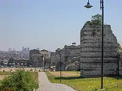 The Palace of the Porphyrogenitus, seen in the background, with the Theodosian Walls in front