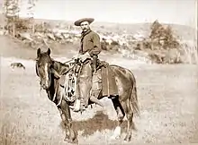 Cowboy con bandana o "wild rag" años 1880