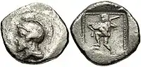 Moneda del Rey Arbinas. Atenea y Heracles a cada lado. Hacia 430/20-400 a. C.