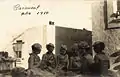 Desfile de Carnaval de 1910 junto a la Calle Peregrina en el barrio de Triana.
