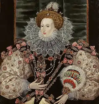 Isabel I de Inglaterra. Puños a juego con la lechuguilla