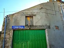 Señal de entrada a Torrecilla desde La Nava