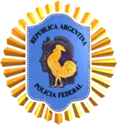 La silueta de la Libertad de Oudiné integra el escudo de la Policía Federal Argentina.