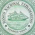 Escudo del Banco Nacional Ultramarino, tomado de un billete mozambiqueño de 100 escudos.