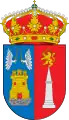 Escudo partido: 1º de azur (azul), un castillo sostenido por un monte de peñas de oro moviente de la punta con la torre del homenaje acostado de dos brazos alados de oro enfrentados y empuñando una espada de plata guarnecida de oro; 2º de gules (rojo), un obelisco de plata sumado de un león coronado empuñando una espada de oro. Sobre el escudo la Corona Real del Reino de España.