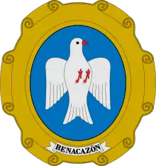 Escudo del municipio español de Benacazón: «En campo ovalado de azul celeste, una paloma blanca»