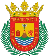 Escudo de la isla de Tenerife, con el Teide en erupción en el centro.