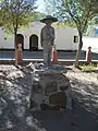 Estatua de niño en plaza de Barrancas