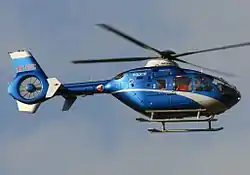 Blue-and-gray police helicopter