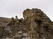 Markus Landgraf of Crew 7 uses a geologist hammer to obtain rock samples during EVA.