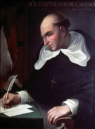 Painting of a balding man sitting at a desk and writing with a quill. He wears a dark religious robe and with a white hood and white undersleeves, and a crucifix pendant and is looking down at the three sheets of paper in front of him. His left hand is resting on an armrest.