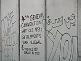 Grafiti cerca de Ni'lin, haciendo referencia al Cuarto Convenio de Ginebra