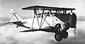 El prototipo para la Armada estadounidense Grumman XFF-1 (Nº A8878) en vuelo hacia 1932.