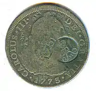 Anverso de moneda de 8 reales (plata) de Carlos III de 1773 resellada en la India danesa.