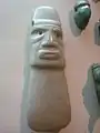 Con incisiones y formas geométricas en apariencia sencillas, en esta figura de jade blanco altamente trabajada pueden apreciarse todos los detalles de un rostro.