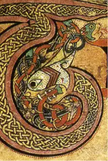 Detalle de una decoración del libro de Kells hecha de entrelazados y una espiral zoomorfa, fol. 24.