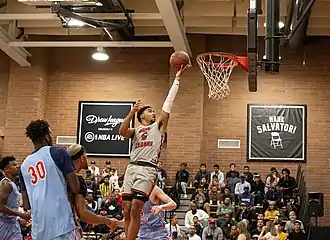 Kenyon Martin Jr. laying up the basketball.