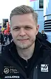 Kevin Magnussen wearing a black Haas jacket