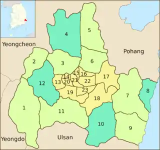 Map of the coastal district previously mentioned. Its center, covering about a sixth of the area, is divided into 11 subdivisions. The surrounding regions are divided into eight subdivisions in a different color. The rest, four subdivisions in a third color, are scattered to the northeast, west, southeast and east respectively.