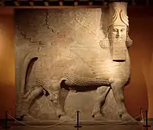 Inicialmente representada como una diosa en tiempos de Sumerian, cuando se la llamaba Lamma, más tarde fue representada desde la época asiria como un híbrido de un humano, un pájaro y un toro. o león bajo el nombre Lamassu. Aparece con frecuencia en Arte mesopotámico y Arte iraquí.