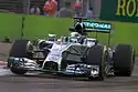 Lewis Hamilton driving a silver Mercedes Formula One car at the 2014 Singapore Grand Prix