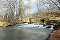 Puente sobre el Turia frente a las Casas de Angelina (Libros), antes de que la Rambla de Riodeva (Río Eva) rinda sus aguas al Turia (2021).